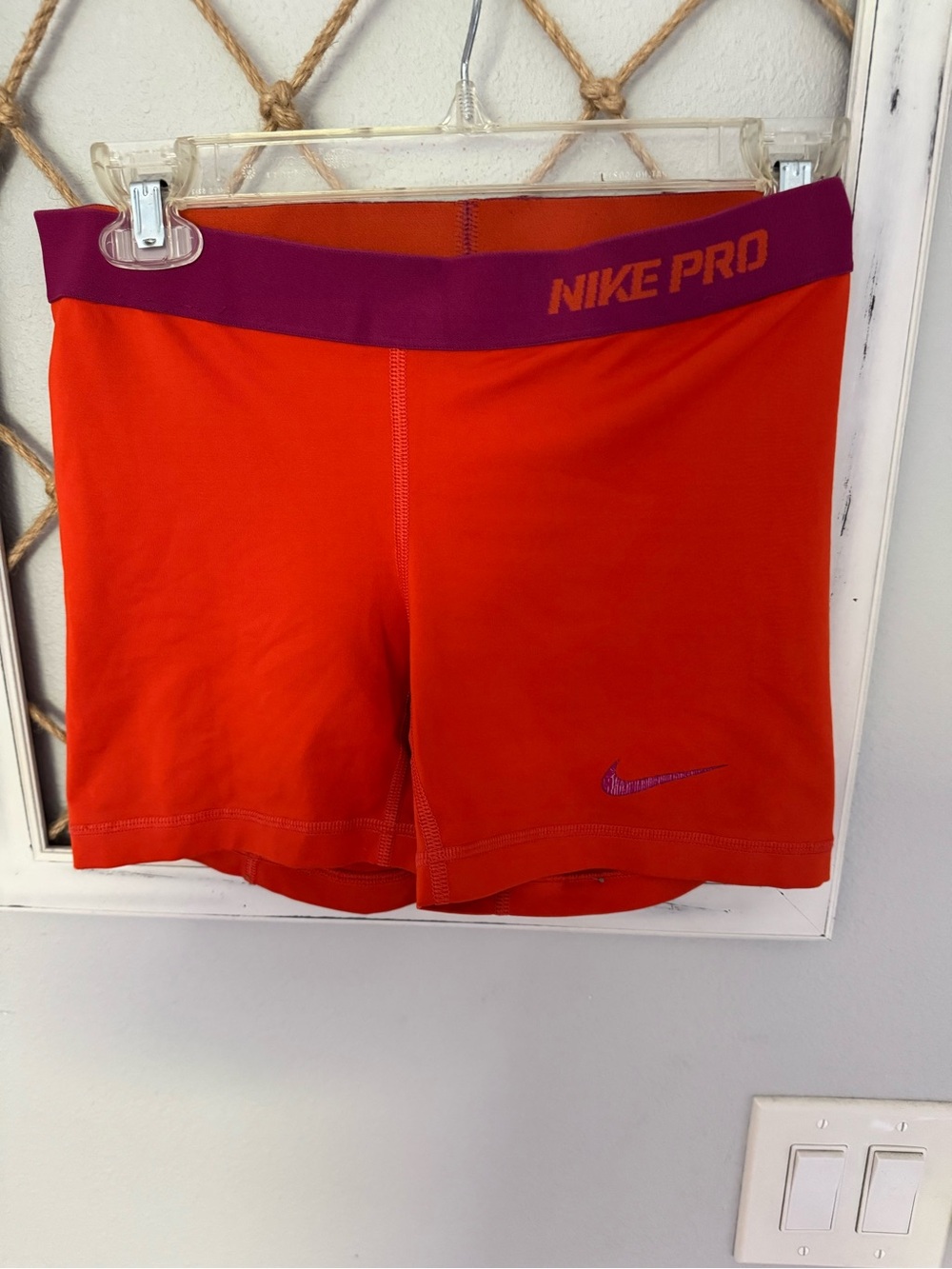 Nike Pro Women's Bright Orange Bike Shorts with Purple Waistband